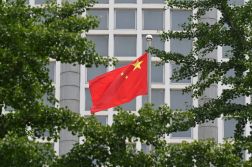 The Chinese national flag flies outside the Ministry of Foreign Affairs in Beijing on July 26, 2023. (Photo by GREG BAKER/AFP via Getty Images)